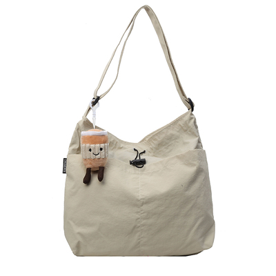 帆布包女斜挎2025新款大容量女士包包高级感小众通勤布包休闲挎包