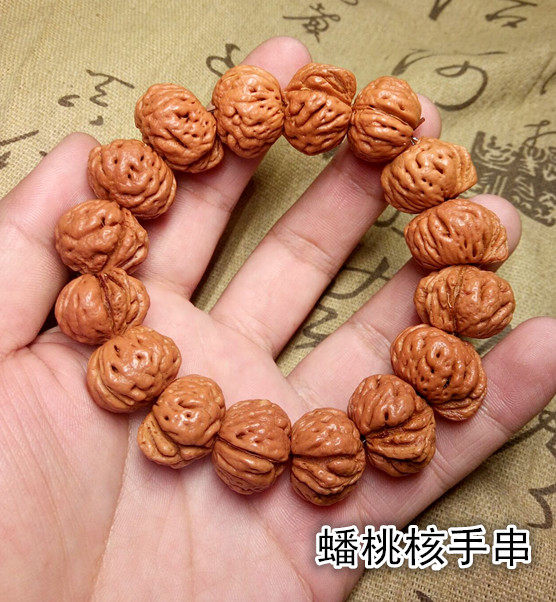 蟠桃核的打孔位置,蟠桃核怎么打孔,蟠桃核盘玩效果图_大山谷图库