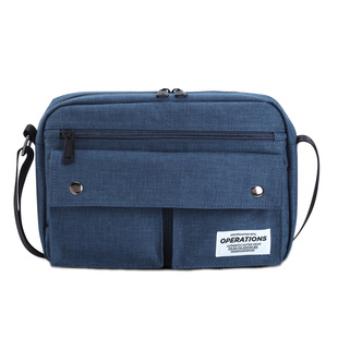 日系纯色经典牛津纺邮差男女青年休闲工装多层功能斜挎包时尚简约