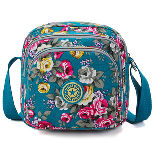 斜挎包女韩版帆布多层新款运动百搭单肩妈妈包斜挎休闲中年花布包