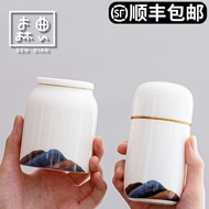 Lon trà gốm sứ cao cấp hộ gia đình lưu trữ di động kín chống ẩm lưu trữ lon cao cấp thùng nhỏ bộ ấm trà du lịch
