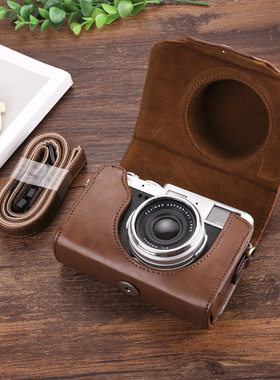 适用富士X100V系列X30皮套尼康J5松下GF9lx100佳能相机包防摔收纳