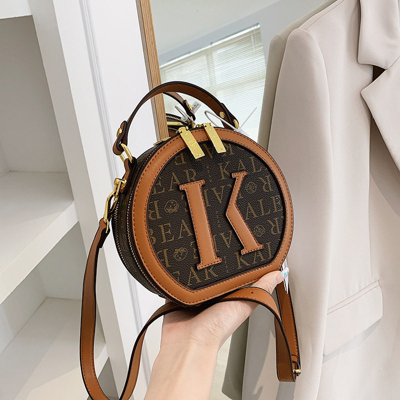 卡乐熊女包潮流新款时尚韩系单肩圆饼包高级感百搭手提斜挎苹果包