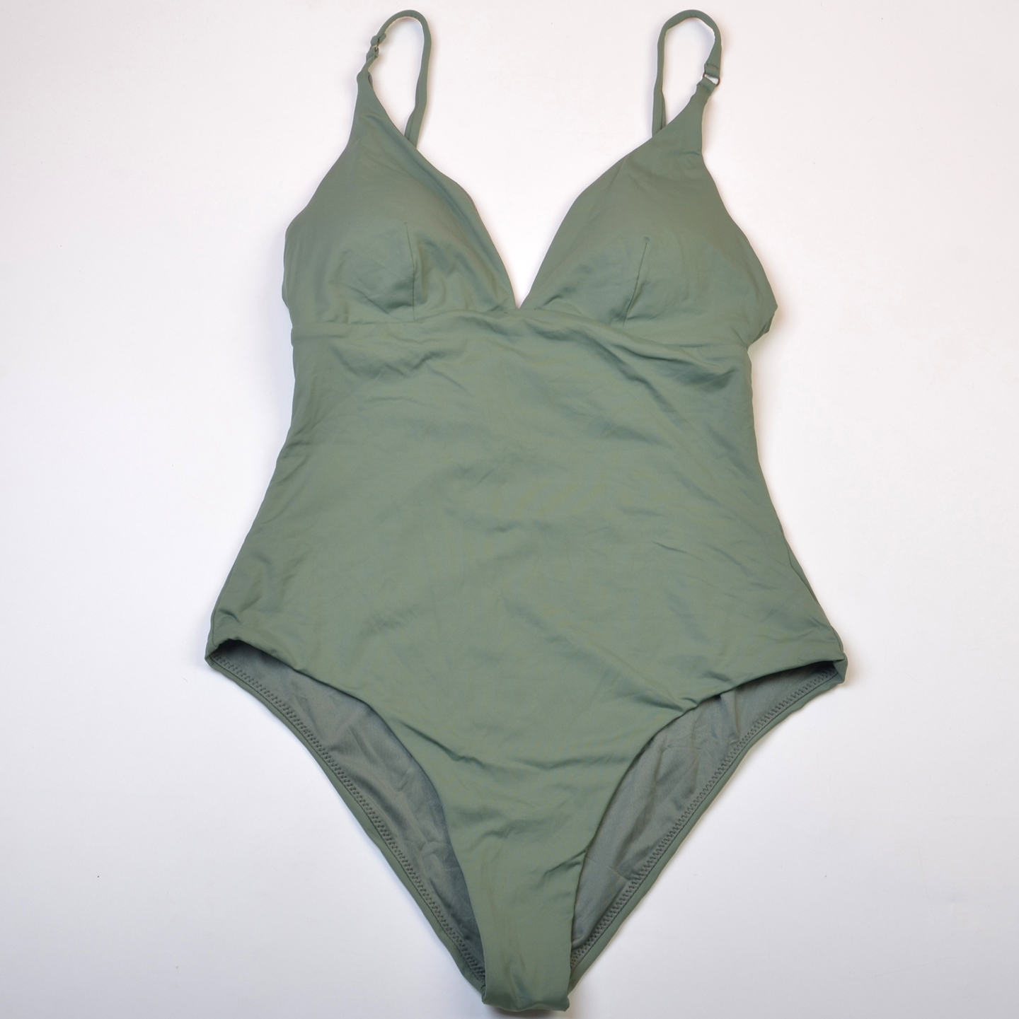 澳洲冲浪品牌O家时尚沙滩度假性感显瘦纯色连体泳衣女泳装带胸垫