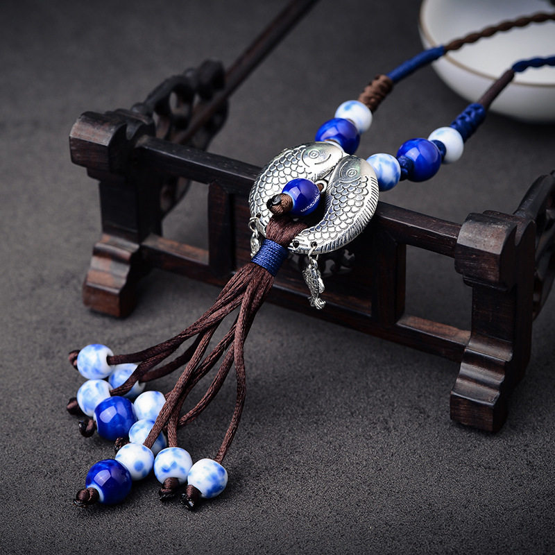 陶瓷蓝色流苏串珠民族风韩国气质复古毛衣链长款编织项链小鱼女