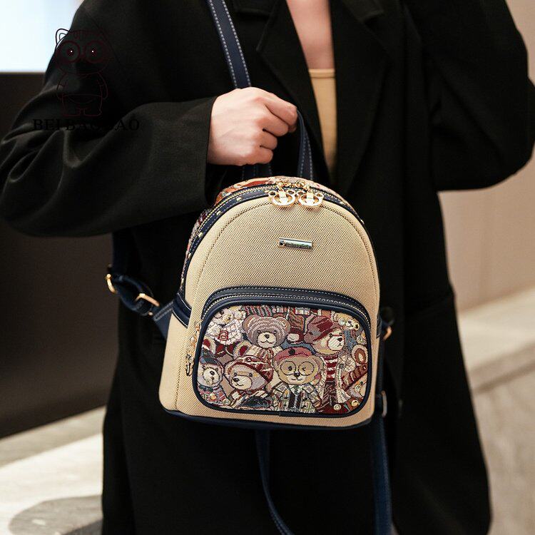 双肩包女包2026新款卡通帆布书包小熊图案大容量百搭休闲撞色背包