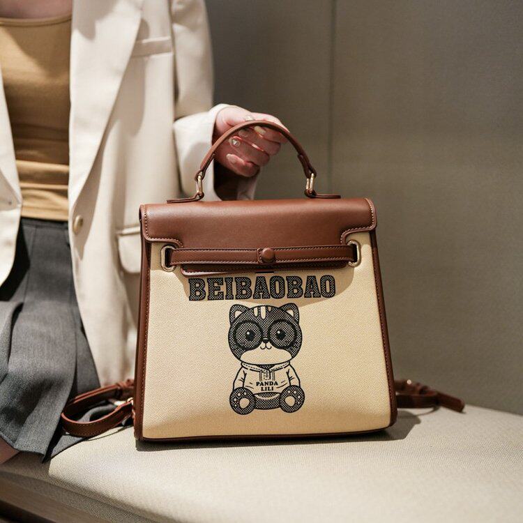 2026新款韩版时尚双肩包女单肩包撞色通勤背包大容量卡通小熊书包