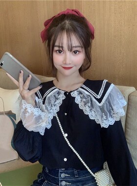 春秋韩版新款宽松洋气娃娃领蕾丝花边单排扣长袖衬衫上衣女装2026