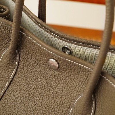 无注册商标牛皮蜡线手缝中古包