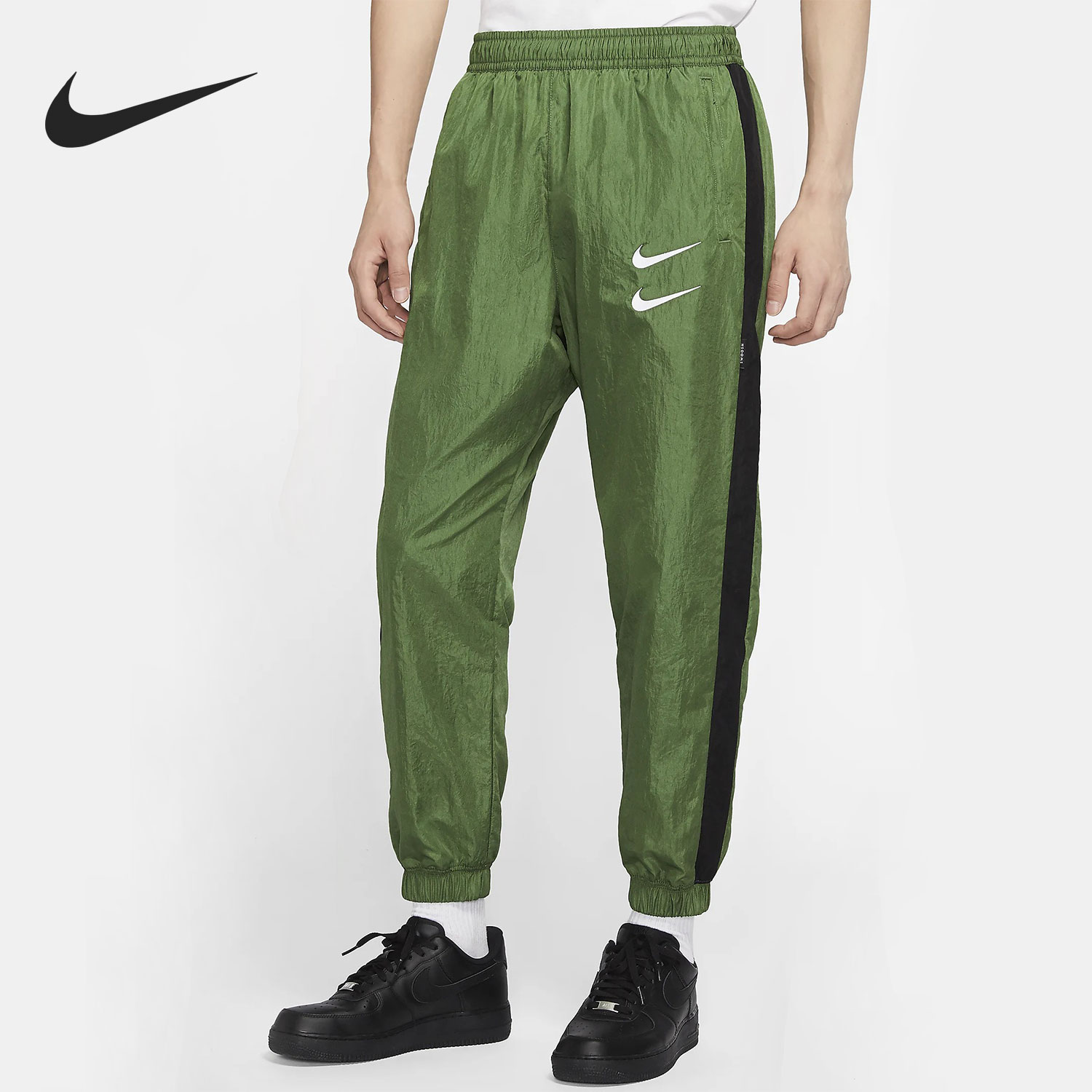 耐克双钩梭织束脚男子防风卫裤