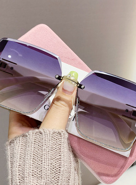 无框2025新款时尚大框细闪太阳眼镜女士圆框显瘦度假防紫外线墨镜