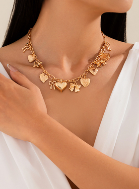 流苏桃心蝴蝶结十字链项链女 2026春季潮嘻哈设计旅行度假配饰品