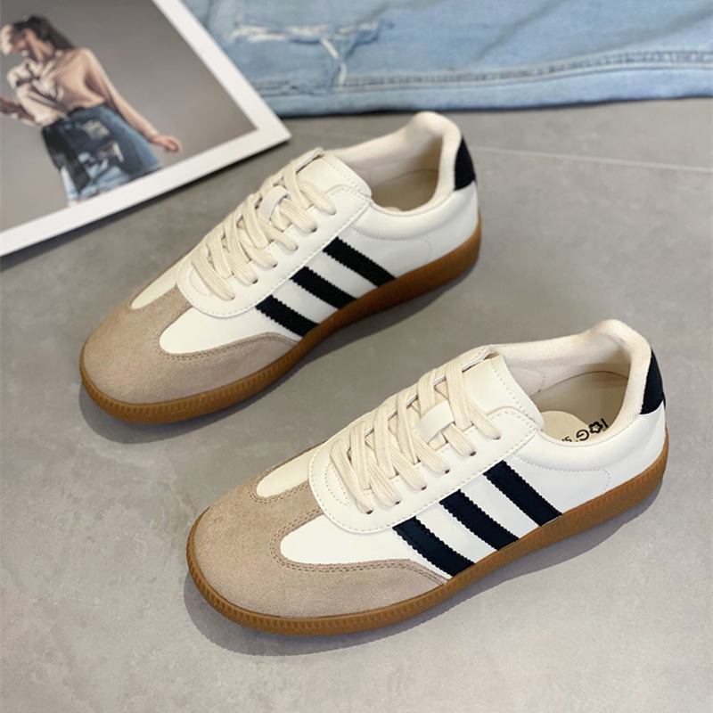 休闲时尚平底圆头德训小白鞋