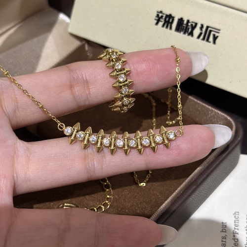 辣椒派钛钢镀金可洗澡 智性风子弹头铆钉项链女5a锆石满钻戒指
