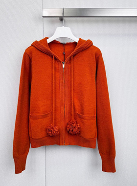 落日橙色双插袋设计长袖连帽毛衣