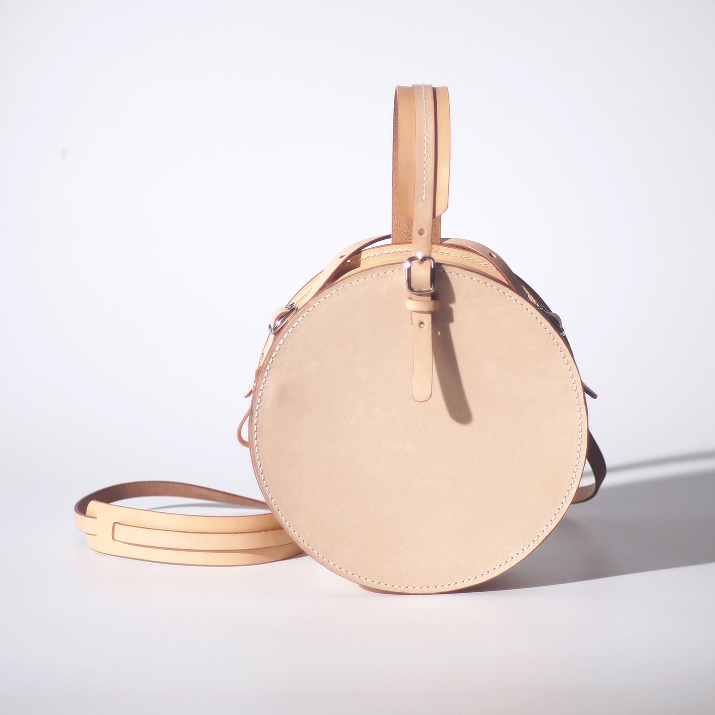 孤鹤原创手工植鞣牛皮斜挎小圆包