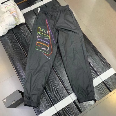 耐克Nike 男子秋冬休闲宽松舒适收口梭织运动防风拒水长裤 DX0622