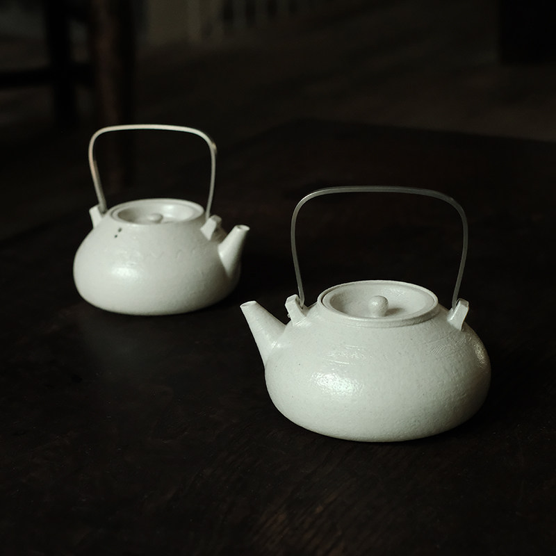 合行序 安拾煮水壶煮茶壶金属提梁白陶壶手工制作电碳炉双用480ml