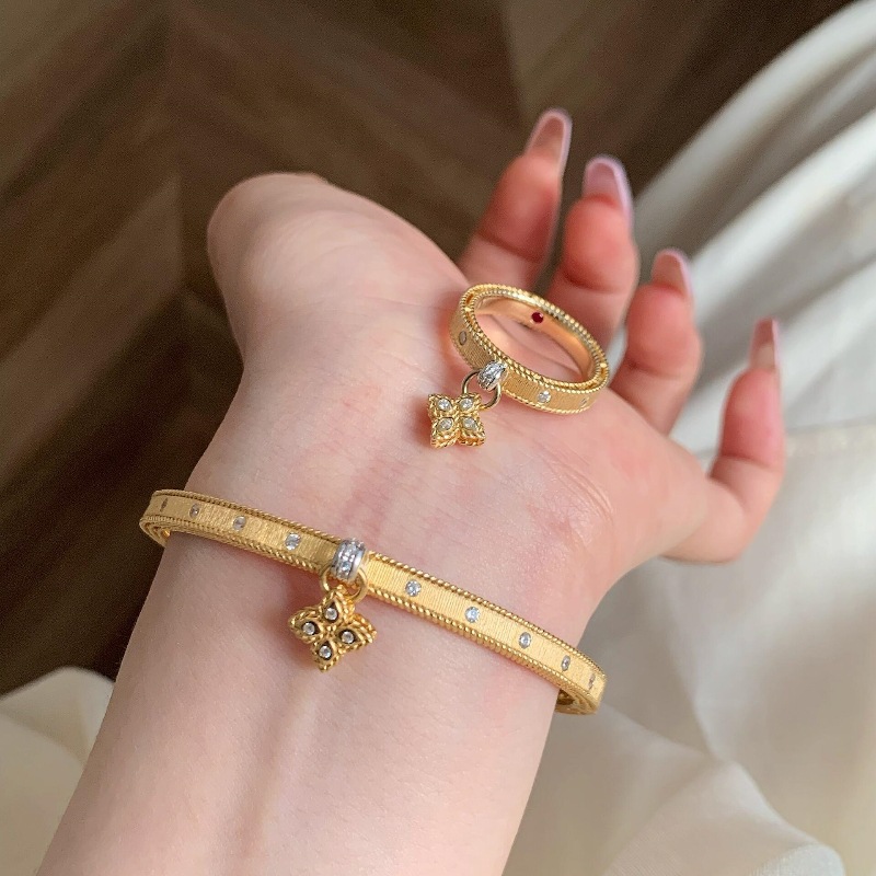 s925银风拉丝四叶草镶钻流苏戒指