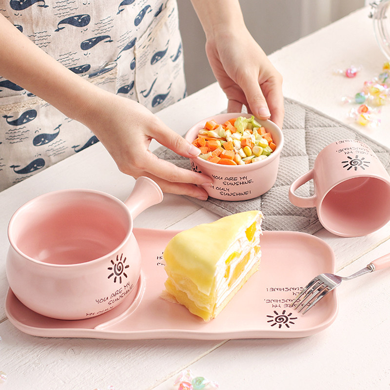 One person has a matte Japanese ceramic breakfast plate
