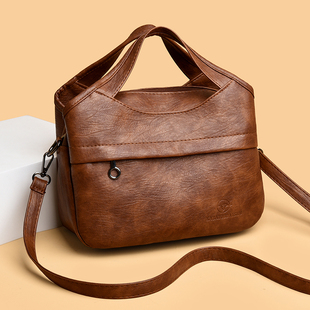 手提包包女休闲斜挎包2026新款轻便单肩背包多层大容量挎包通勤包