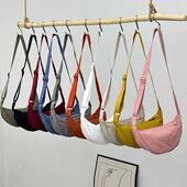 试衣间百搭学生通勤饺子包防水轻便斜挎包女马卡龙简约单肩包尼龙