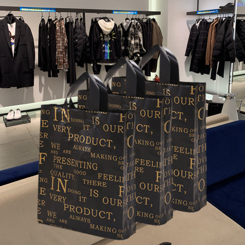 服装店竖版时尚防水潮男手提袋