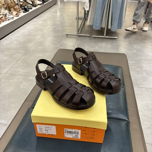 赫谷女鞋2026夏季新款复古牛皮编织罗马凉鞋镂空平底包头猪笼鞋