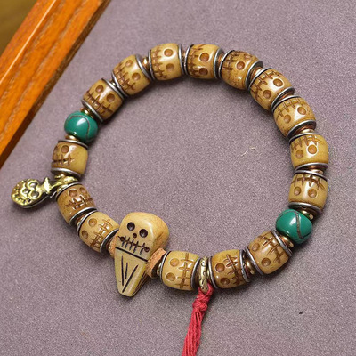 藏传回流牦牛骨雕刻阿呆手串单圈藏式文玩佛珠料器铜配饰复古手链