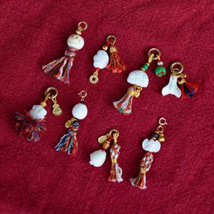 原创手工编织文玩驼骨小侧挂金色扣头流苏手机挂绳时尚包包挂饰批