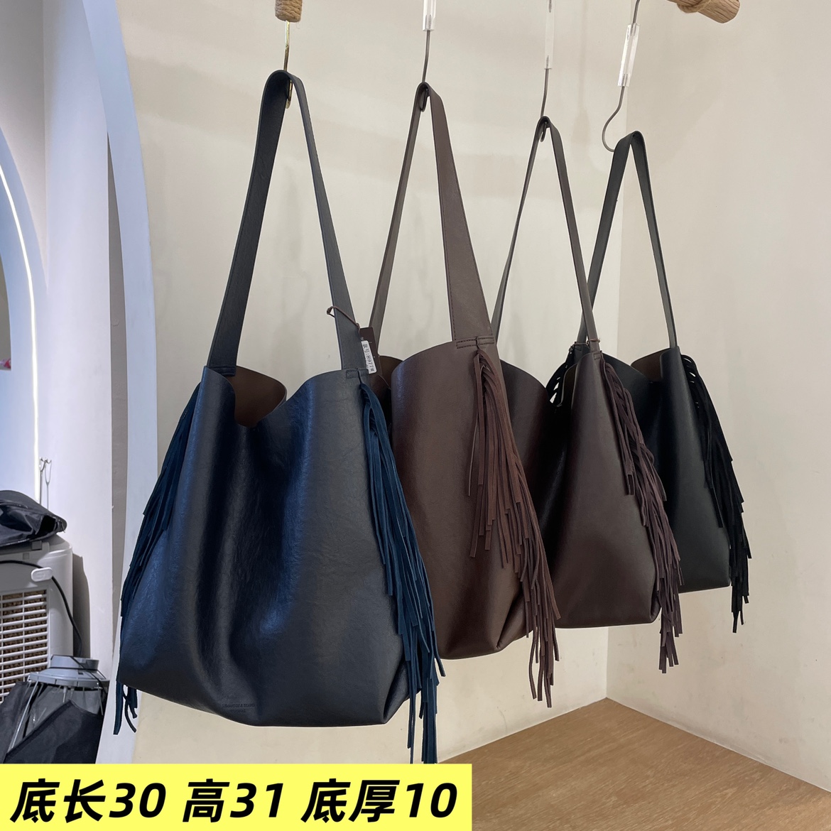 莱曼多斯质感女包2025新款时髦流苏洋气8977轻奢软单肩斜挎包水桶