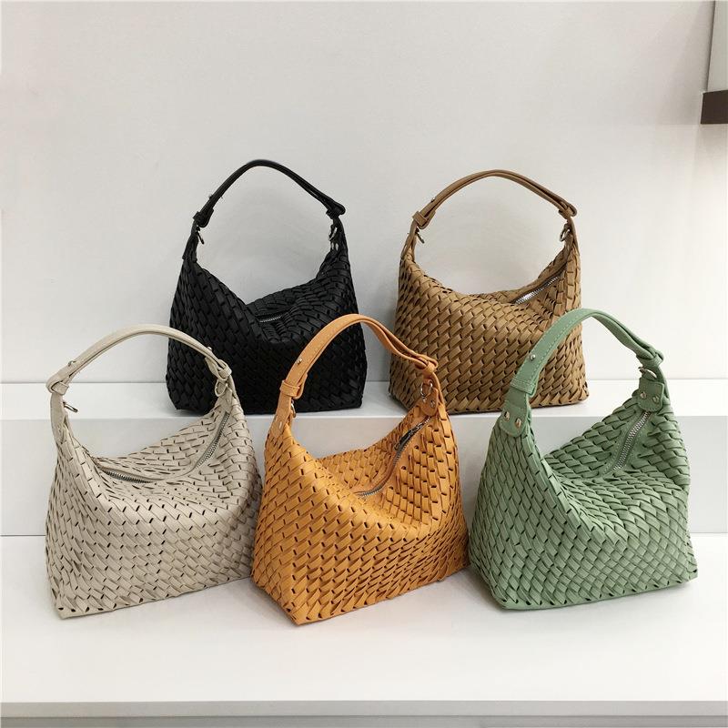 日本新品小众设计质感手提女包包软编织包单肩斜挎包腋下饺子包