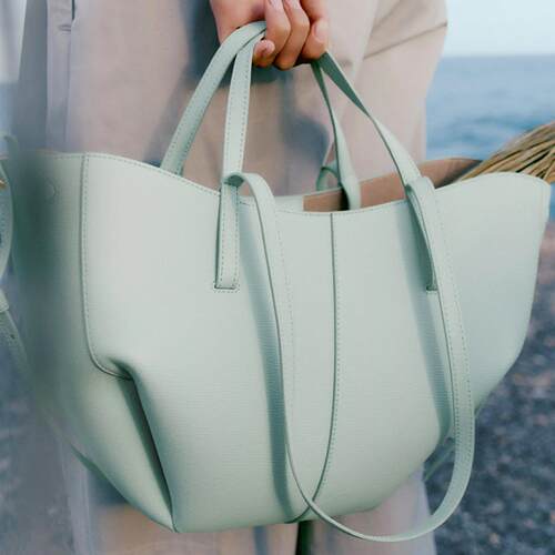 日本现货翅膀包法国cyme牛皮单肩腋下包小众设计水桶包通勤托特包