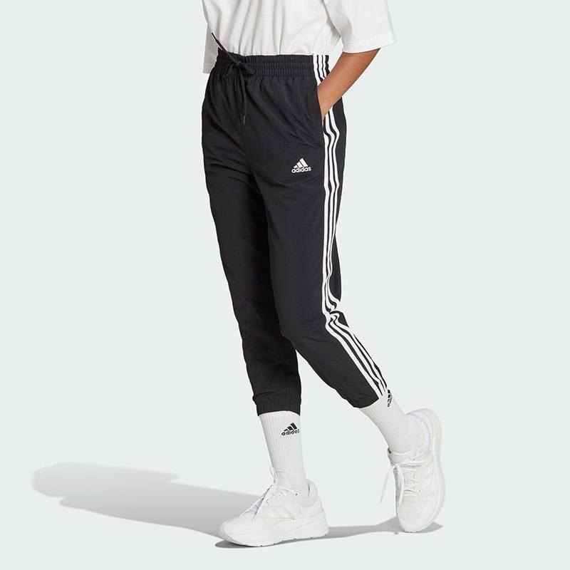 adidas阿迪达斯 女子梭织户外训练时尚健身运动长裤HT3398