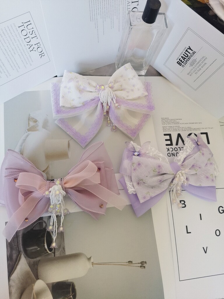 新款韩版小清新珍珠流苏蝴蝶结弹簧夹顶夹马尾夹盘发夹后脑勺发饰