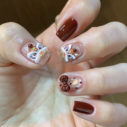 喜庆可爱蝴蝶结小醒狮美甲