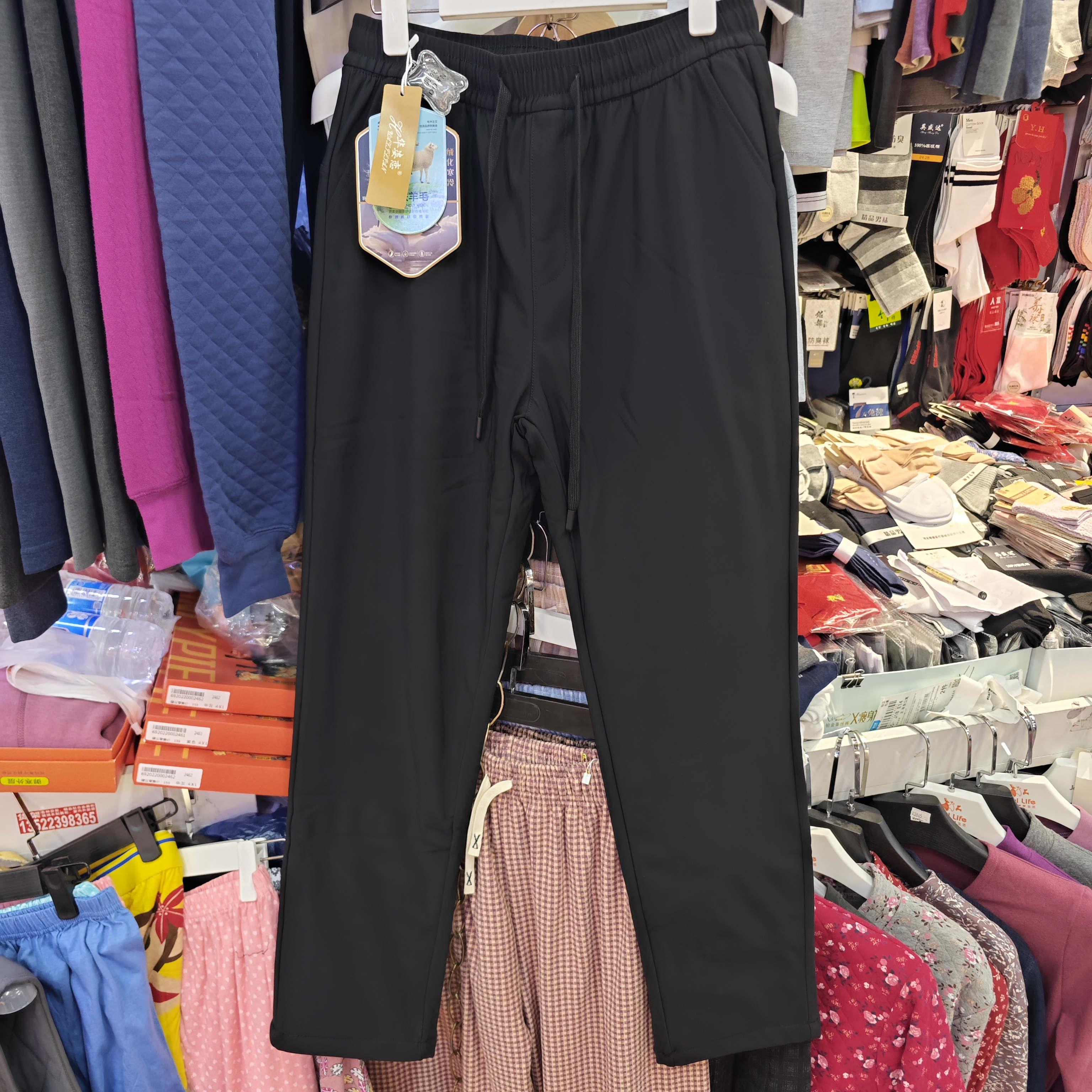 华姿恋2508男一条过冬防风舒适透气弹力加厚羽绒棉裤保暖黑色直口