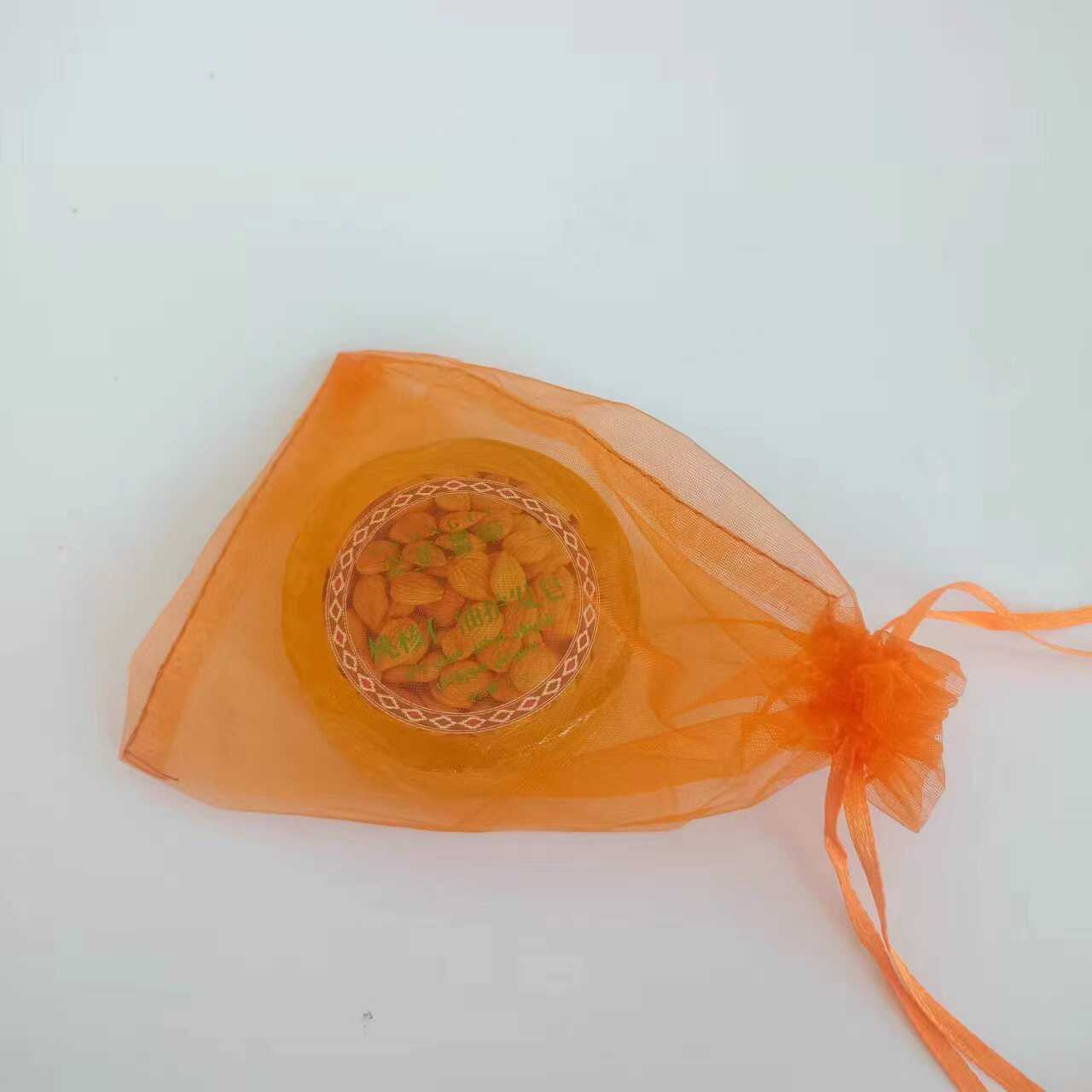 橙色幼儿园糖果包装欧根纱袋子