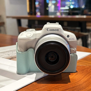 佳能R50相机保护套R50V皮套R100可爱适用R10底座包200D二代配件