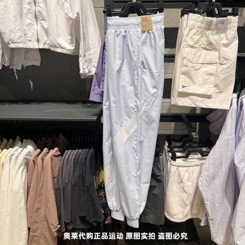 NIKE耐克女子大勾印花LOGO透气舒适束脚运动梭织长裤HM8977-423