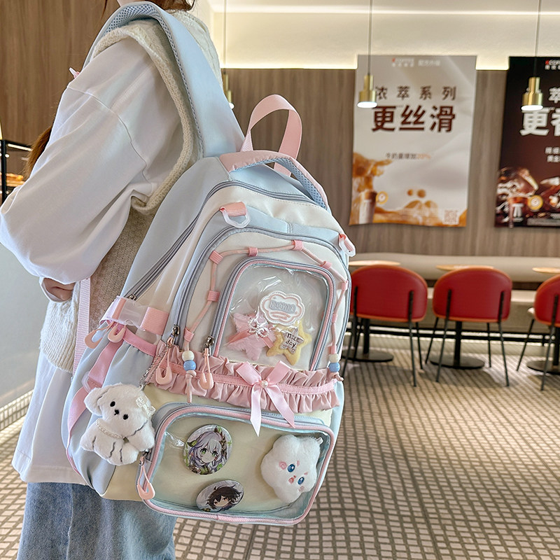 高颜值二次元风初中高中小学生轻便减负书包女可爱背包森系双肩包