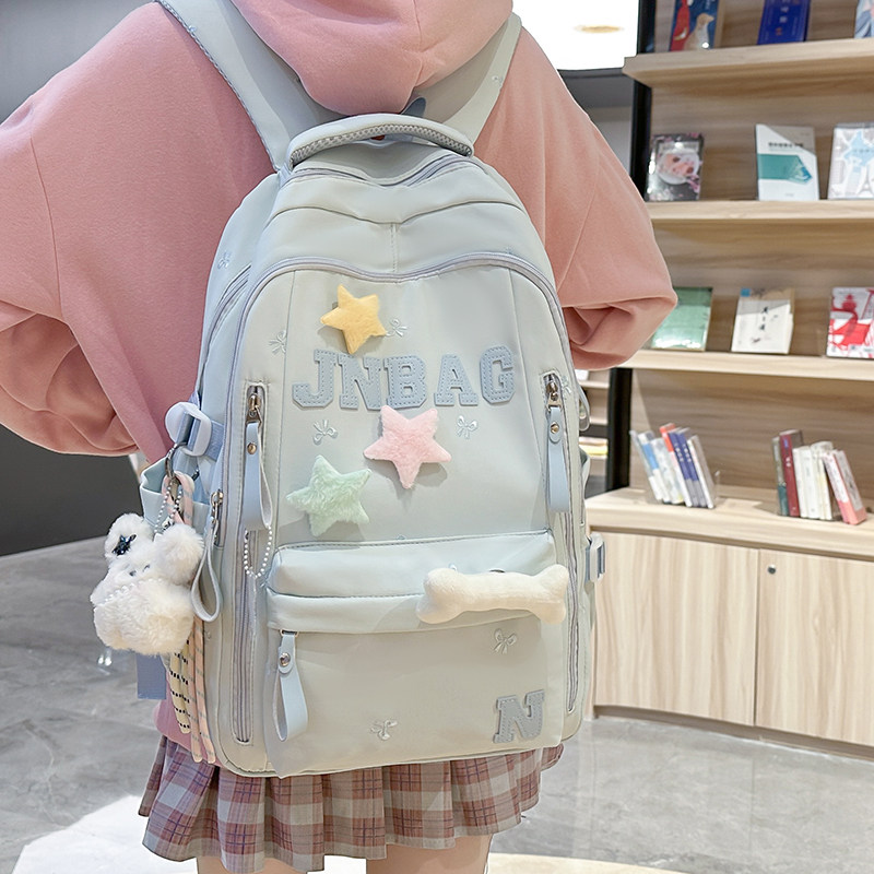 初中生书包女韩版百搭高中小学生轻便减负背包小清新蝴蝶结双肩包