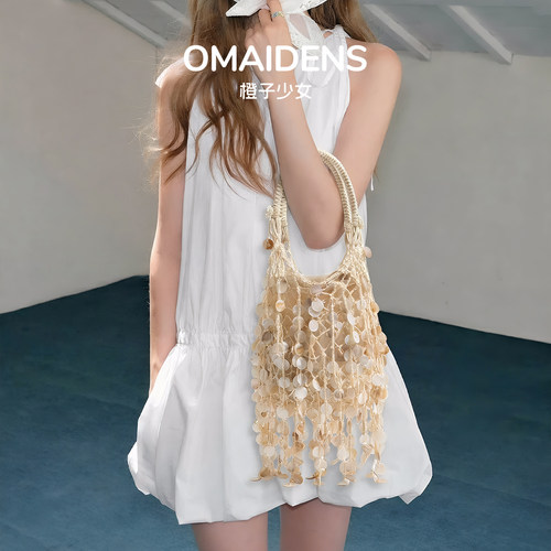 橙子少女民族风编织流苏水桶包