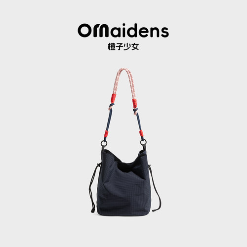 橙子少女山系拼色编绳尼龙水桶包