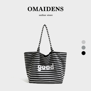 橙子少女黑白条纹帆布包女大容量单肩包通勤百搭慵懒风托特包手提