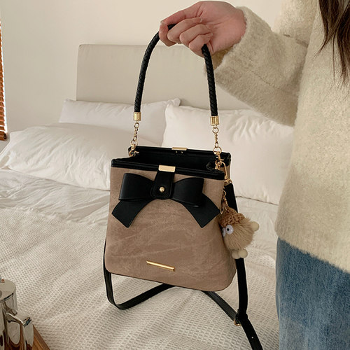 蝴蝶结复古文艺手提水桶包包