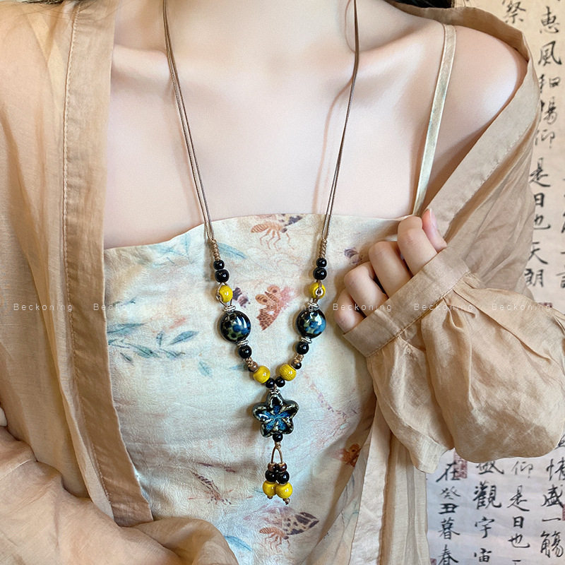 新中式复古陶瓷花朵串珠项链女款民族风长款流苏毛衣链高级感