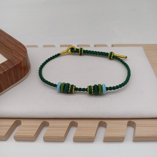 手工编织4股墨绿可穿珠半成品手绳桃花结DIY可串黄金转运珠手链女