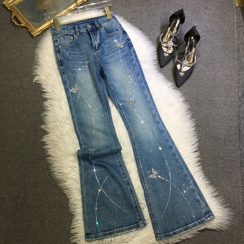 欧货重工烫钻牛仔裤女蓝色显瘦蝴蝶结钉珠高腰修身微喇裤子春夏季
