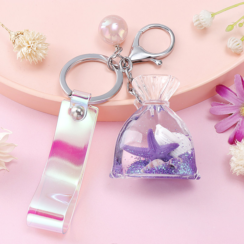 高档流沙钥匙扣女款简约网红个性钱袋漂浮海星可爱少女包汽车挂件